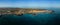 Mid level aerial panoramic view of Corralejo harbour, town and beaches