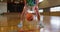 Mid section of african american female basketball player dribbling ball