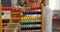 Mid section of Caucasian schoolgirl learning mathematics with abacus in the classroom 4k