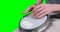 Mid section of drummer playing drum