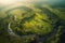 Midday Serenity: A Drones View of a Vast Green Meadow and Winding River