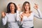 Middle age beautiful couple of sisters wearing casual t-shirt over isolated white background relax and smiling with eyes closed