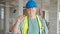 Middle age grey-haired man builder smiling confident standing at construction site