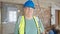 Middle age grey-haired man builder smiling confident standing at construction site