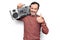 Middle age handsome man listening vintage boombox over isolated white background smiling happy and positive, thumb up doing