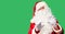 Middle age handsome man wearing Santa Claus costume and beard standing disgusted expression, displeased and fearful doing disgust