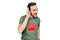 Middle age handsome man wearing t-shirt with revolutionary red star over white background smiling with hand over ear listening and