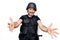 Middle age handsome policeman wearing police bulletproof vest and security helmet looking at the camera smiling with open arms for