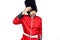 Middle age handsome wales guard man wearing traditional uniform over white background worried and stressed about a problem with