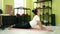 Middle age hispanic woman training yoga at sport center