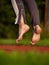 Middle age woman stretching knees and ankles, she jumping bare feet