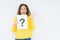 Middle age woman thinking and holding paper with question mark symbol over isolated background very happy and excited, winner