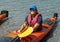 Middle-aged Caucasian man ready for a kayaking adventure in the Atlantic Ocean at Bar Harbor, Maine.