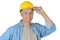 Middle aged Construction Worker Hand on Hard Hat