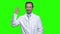 Middle aged male caucasian doctor with ok sign.