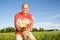 Middle-aged man giving flowers