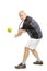 A middle aged man plays tennis. Isolated on a white background