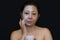 A middle-aged woman Asians are happy with a face mask for skin c
