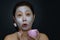 A middle-aged woman Asians are happy with a face mask for skin care.The concept of skin care and beauty