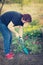 Middle aged woman gardening in spring