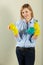 Middle Aged Woman Holding Cleaning Products