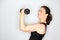 Middle aged woman lifting weights