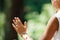 Middle Aged Woman Practicing Tai Chi Chuan in the Park. Close Up On Hands Position