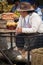 A middle-aged woman selling guinea pigs