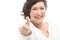 Middle-aged woman shows the cheerful thumbs up