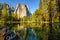 Middle Cathedral Rock reflecting in Merced River at Yosemite