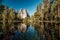 Middle Cathedral Rock reflecting in Merced River at Yosemite