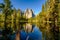 Middle Cathedral Rock reflecting in Merced River at Yosemite