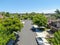 Middle class subdivision neighborhood street with residential villas next to each other.