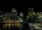 Middle Dock And The Brightly Lit Bank Towers In Canary Wharf London England At Night