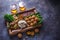 Middle eastern party food: falafel, babaghanoush, potatoes, beef, green veggies.