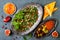 Middle Eastern traditional dinner. Authentic arab cuisine. Tabbouleh, sambusek, muhammara, pumpkin hummus.