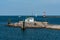 Middle pier in Warnemuende with red beacon in the background