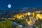 Middle Trikala view in Corinth Greece against the full moon. A beautiful touristic destination.