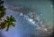 Midnight landscape with coconut palm tree Silhouette and Milky Way in the sky