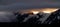 Midnight sun over the snowy mountains