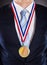 Midsection of businessman wearing medal