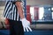 Midsection of male referee gesturing with hand