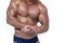 Midsection of shirtless man flexing muscles