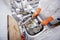 Midsection of woman washing utensil at kitchen sink