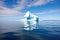 midsize iceberg drifting on tranquil ocean