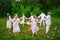 Midsummer. Young people in Slavic clothes revolve around a fire in the Midsummer