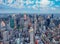 Midtown Manhattan at sunset, New York City. Panoramic aerial view of city skyscrapers at dusk