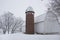 A midwest barn with fresh snow in January.