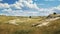 Midwest Grassland: A Photorealistic Rendering Of Expansive Badlands