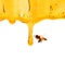 Miel dans le pot en verre avec le vol et les fleurs d`abeille sur un plancher en bois.